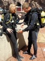 A buddy check before the dive is part of the overall safety management