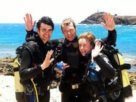 Celebrating after their first dive in the Marine Reserve in Gran Canaria
